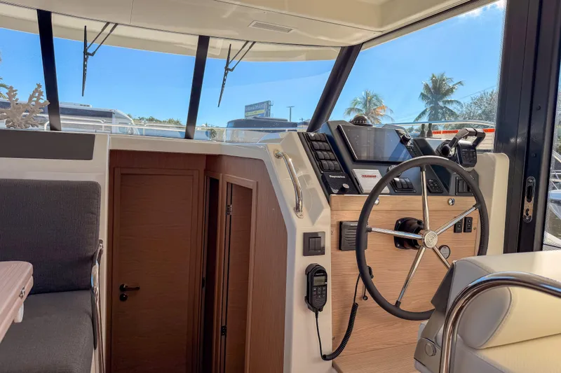 Slide: The Image of Interior view of 2026 Beneteau Swift Trawler 41 Fly helm. - 13