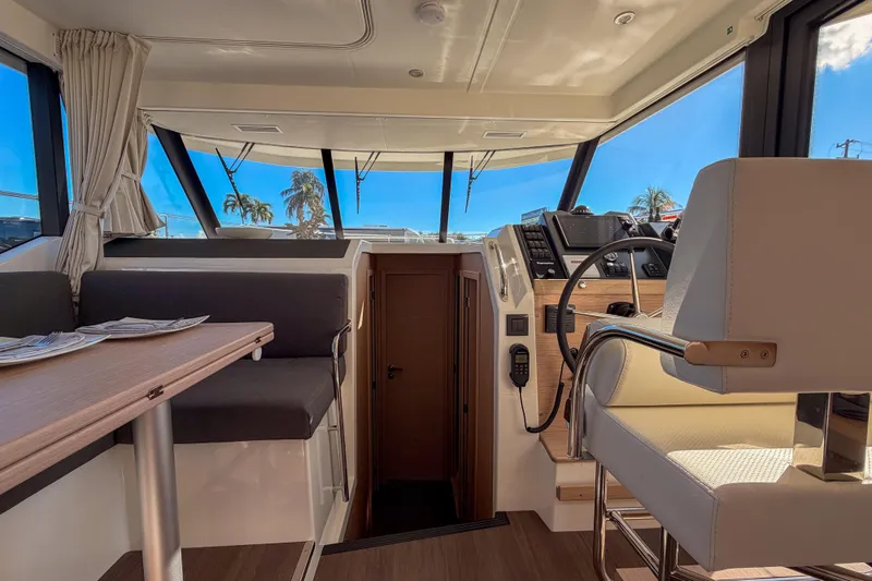 Slide: The Image of Interior of 2026 Beneteau Swift Trawler 41 Fly with helm station. - 14