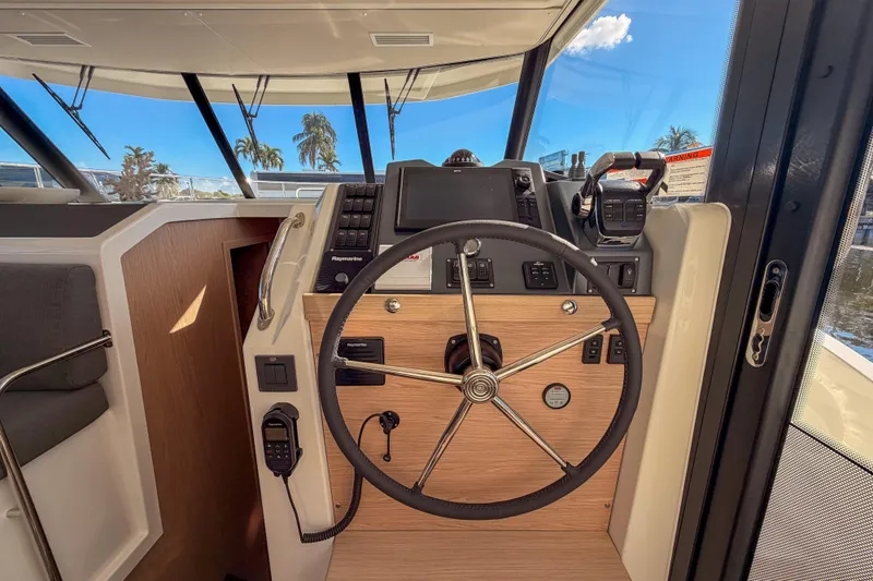 Slide: The Image of Helm station of the 2026 Beneteau Swift Trawler 41 Fly. - 19