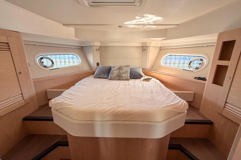 Slide: The Image of Interior of 2026 Beneteau Swift Trawler 41 Fly, cozy bedroom. - 20