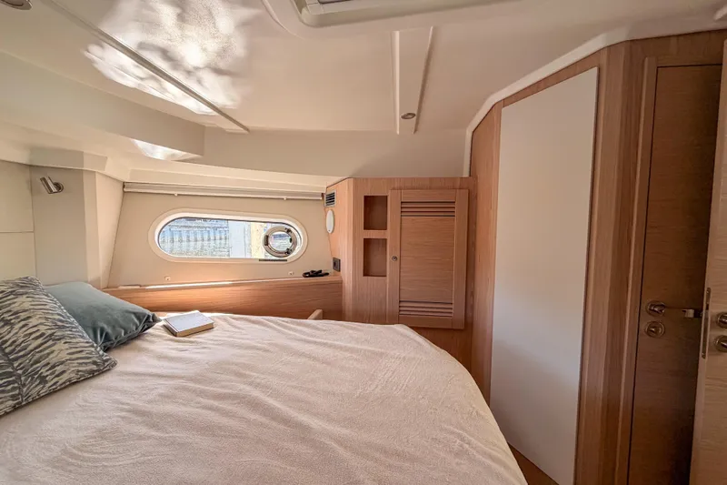 Slide: The Image of Interior of 2026 Beneteau Swift Trawler 41 Fly, cozy bedroom. - 22