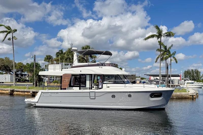 The Image of 2026 Beneteau Swift Trawler 41 Fly on calm waters. - 7