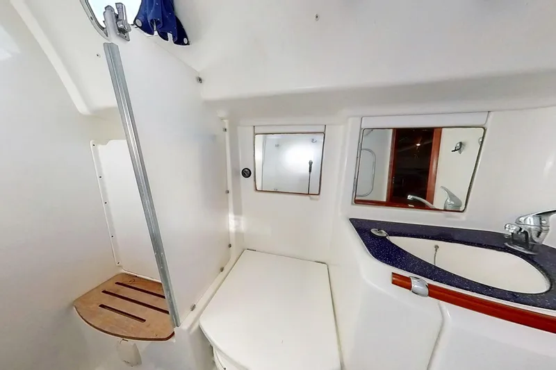 Slide: The Image of Bathroom interior of 2003 Beneteau Oceanis 42CC yacht with shower and sink. - 20