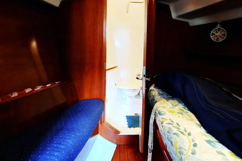 Slide: The Image of Interior of 2003 Beneteau Oceanis 42CC yacht showing cabin and bathroom. - 24