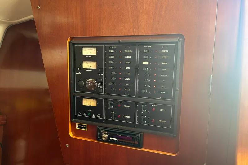 Slide: The Image of Electrical control panel on a 2003 Beneteau Oceanis 42CC sailboat interior. - 64