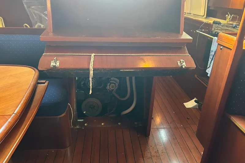Slide: The Image of Engine compartment of 2003 Beneteau Oceanis 42CC sailboat with wooden interior. - 65