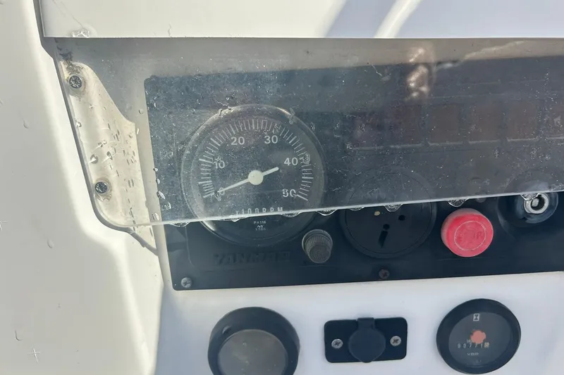 Slide: The Image of Control panel of a 2003 Beneteau Oceanis 42CC sailboat with gauges and switches. - 73