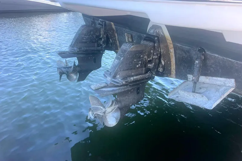 Slide: The Image of 2014 Cruisers Yachts 380 Express stern with dual propellers in water. - 4