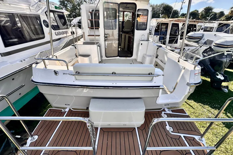 Slide: The Image of 2026 Ranger Tugs R-31 CB boat with spacious deck and modern design. - 3