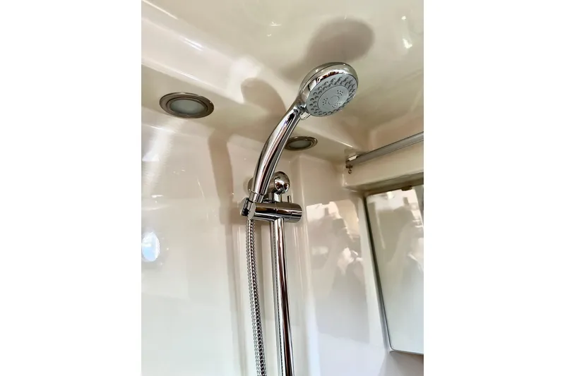 Slide: The Image of Shower fixture in 2026 Ranger Tugs R-31 CB boat bathroom. - 33