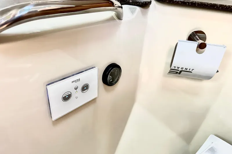 Slide: The Image of Control panel and paper holder in 2026 Ranger Tugs R-31 CB boat interior. - 36