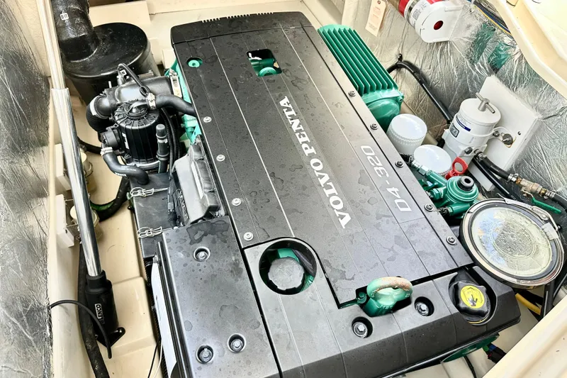 Slide: The Image of Engine compartment of 2026 Ranger Tugs R-31 CB with Volvo Penta D4-320 engine. - 44