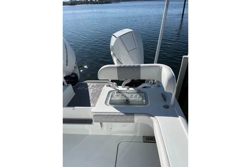 Slide: The Image of 2022 Costa Custom Boats 264 with Mercury engines on calm water. - 17