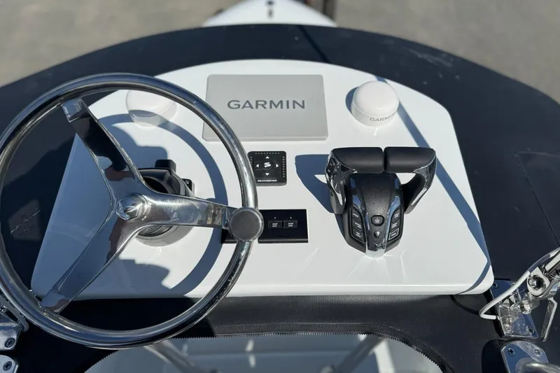 Slide: The Image of Helm of 2026 Contender 25 Tournament boat with Garmin navigation system. - 3