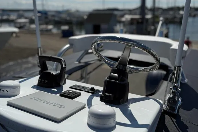 Slide: The Image of Helm of 2026 Contender 25 Tournament boat with Garmin navigation system. - 4