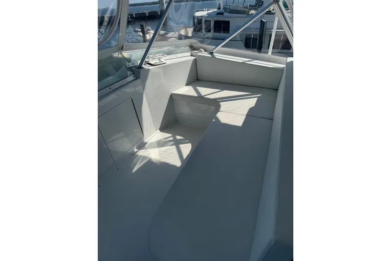 Slide: The Image of Interior seating area of a 2000 Viking 50 Convertible yacht. - 33