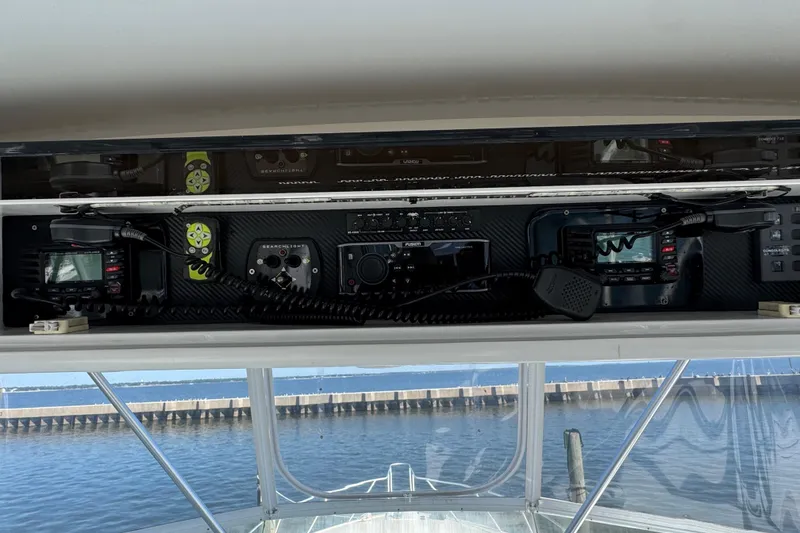 Slide: The Image of Control panel of a 2000 Viking 50 Convertible yacht with marine electronics. - 34