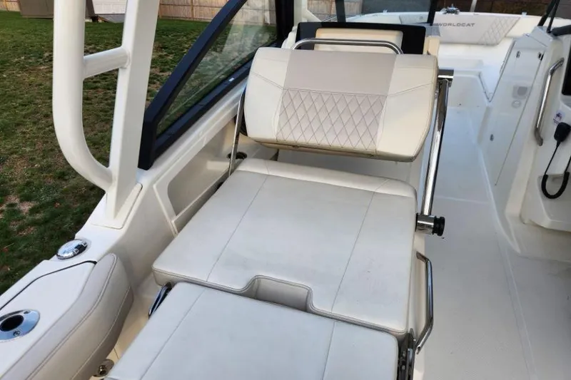 Slide: The Image of 2024 World Cat 260 DC-X boat interior with adjustable seating and modern design. - 26