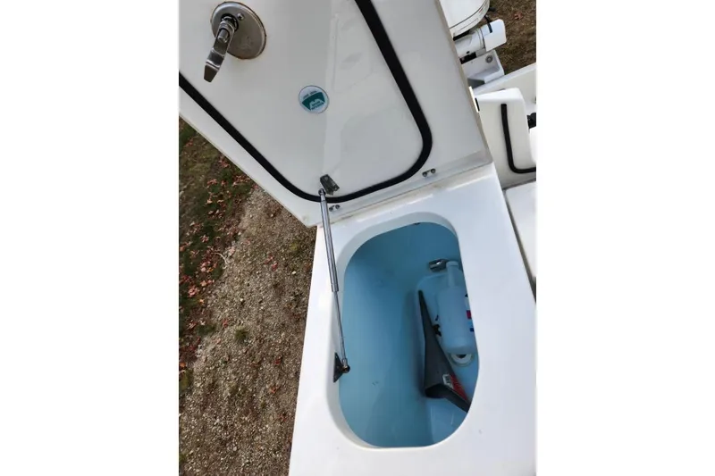 Slide: The Image of Open storage compartment on 2024 World Cat 260 DC-X boat. - 31