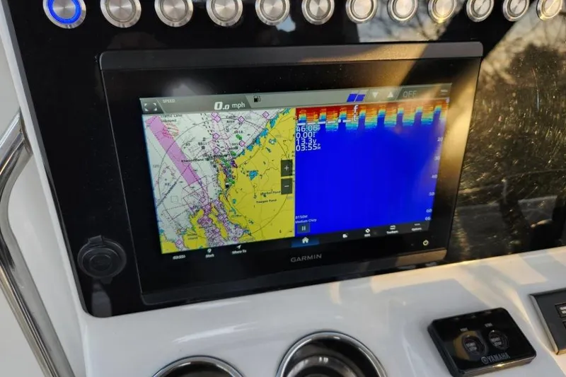 Slide: The Image of Garmin navigation display on 2024 World Cat 260 DC-X boat dashboard. - 37
