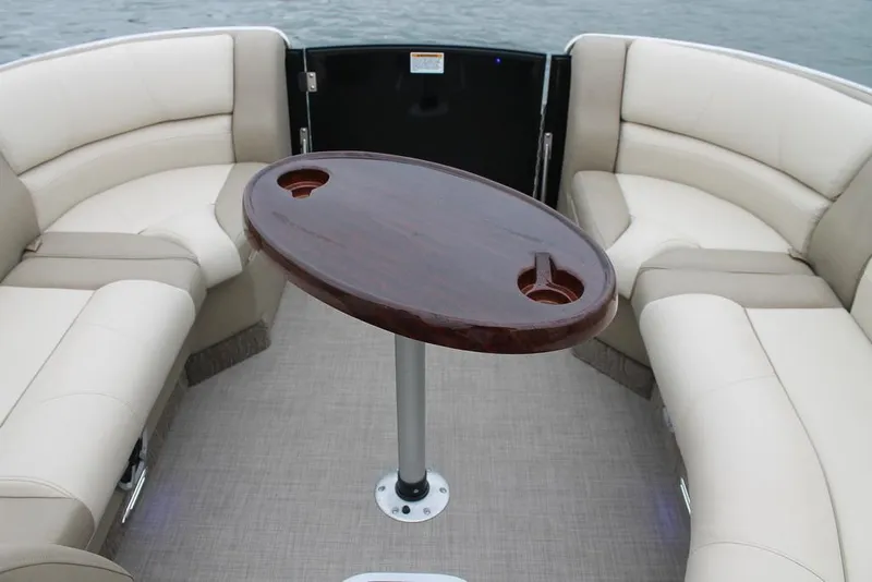 Slide: The Image of Luxurious seating on 2016 Starcraft MX 25 DL boat with wooden deck. - 4