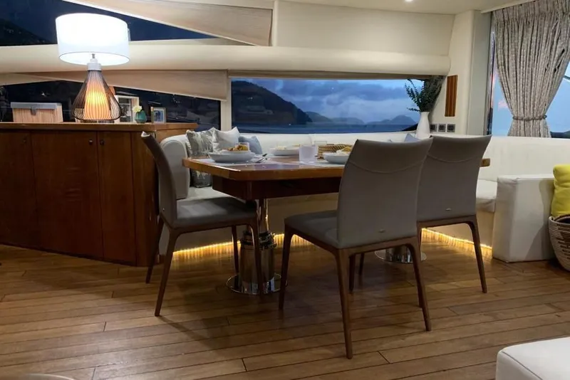 Slide: The Image of Luxurious interior of 2006 Sunseeker Predator 82 yacht with elegant dining area. - 11