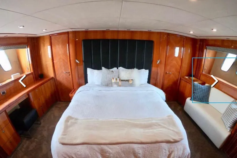 Slide: The Image of Luxurious bedroom interior of 2006 Sunseeker Predator 82 yacht with elegant wood paneling. - 17