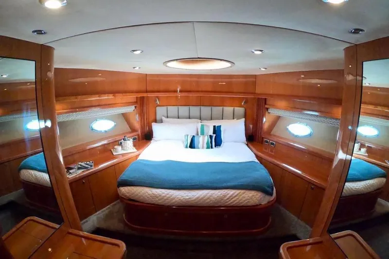 Slide: The Image of Luxurious cabin interior of 2006 Sunseeker Predator 82 yacht with elegant wood finish. - 21