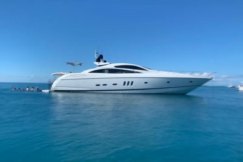 Slide: The Image of 2006 Sunseeker Predator 82 yacht on calm blue ocean waters. - 3