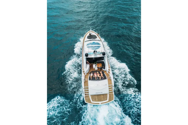 Slide: The Image of Aerial view of 2006 Sunseeker Predator 82 yacht cruising on the ocean. - 5