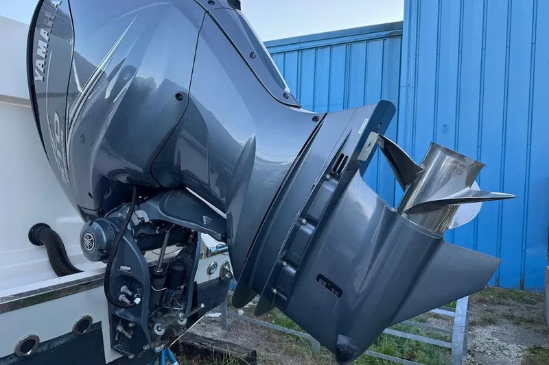 Slide: The Image of Yamaha outboard motor on 2022 Grady-White Freedom 335 boat, blue background. - 5