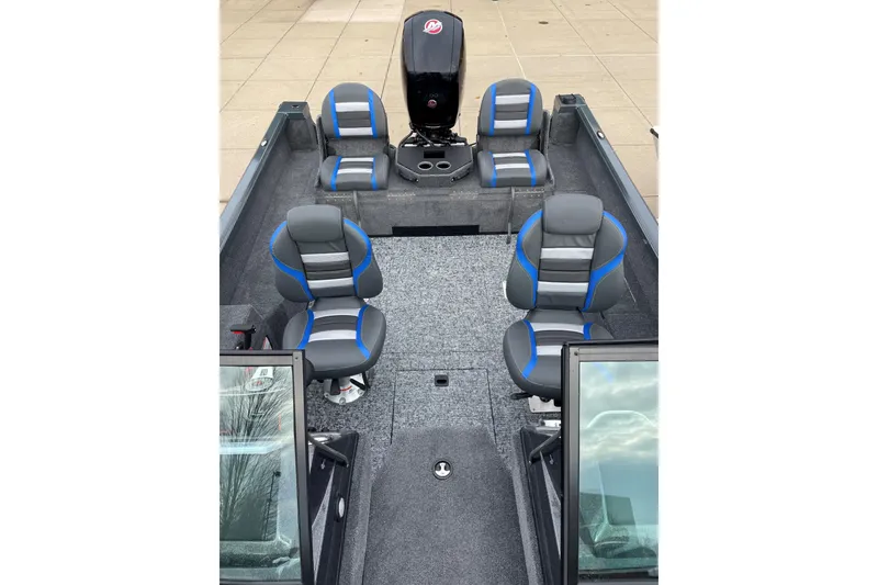 Slide: The Image of 2026 Ranger VS1882SC Angler boat interior with seating and motor, showcasing modern design. - 3