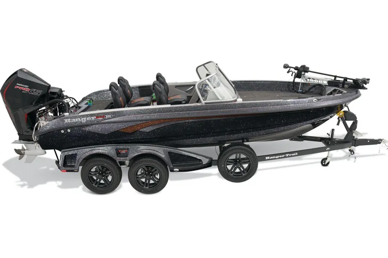 Slide: The Image of 2026 Ranger 620FS Pro boat on trailer in parking lot, overcast sky. - 4