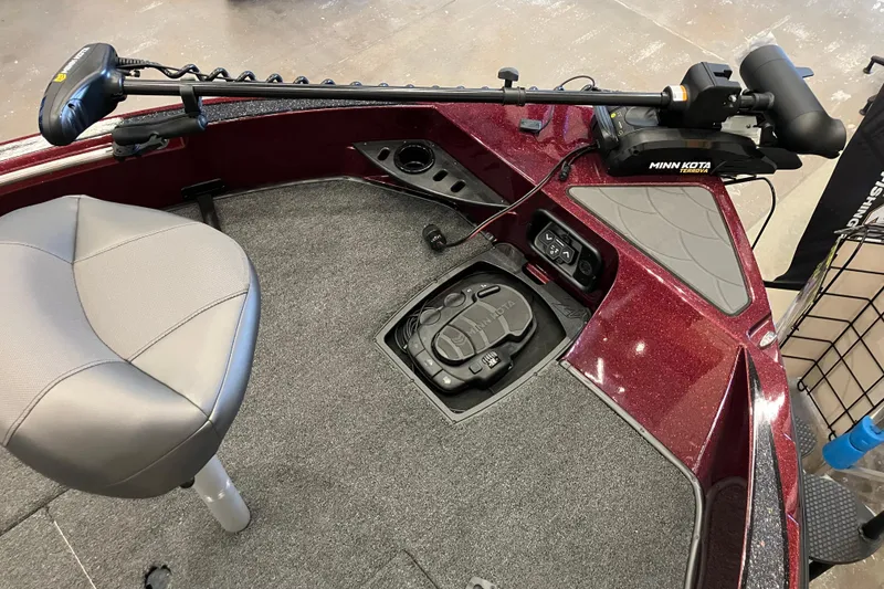 Slide: The Image of 2026 Nitro ZV20 boat interior with Minn Kota trolling motor and gray seat. - 3