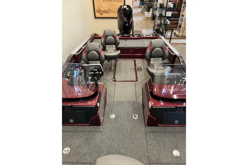 Slide: The Image of 2026 Nitro ZV20 boat interior with seating and control panel in showroom. - 4