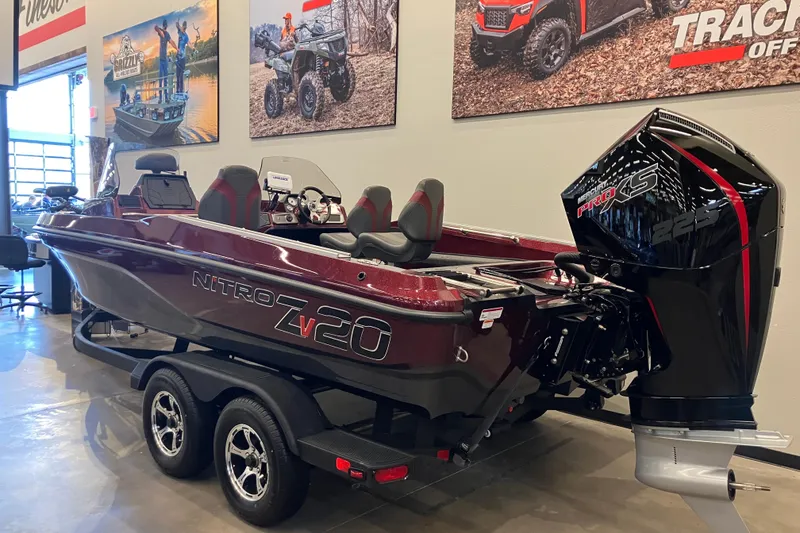 Slide: The Image of 2026 Nitro ZV20 boat with Mercury Pro XS engine displayed indoors. - 1
