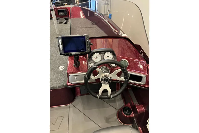 Slide: The Image of Interior of 2026 Nitro ZV20 boat with steering wheel and navigation display. - 5