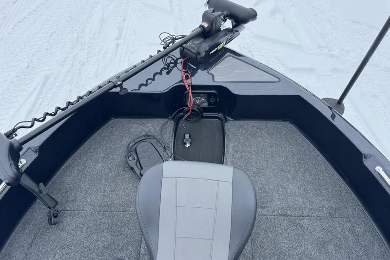 Slide: The Image of 2026 Nitro ZV19 Sport boat interior with trolling motor and seating. - 7