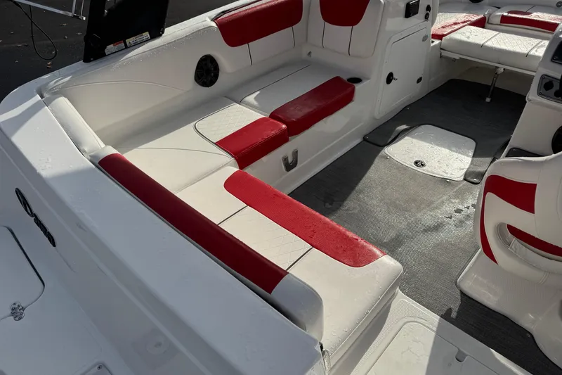 Slide: The Image of 2025 Tahoe 2150 boat interior with red and white seating, showcasing modern design. - 5
