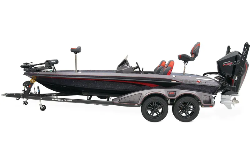 Slide: The Image of 2026 Ranger Z519R boat with powerful outboard motor, parked outdoors on a trailer. - 3