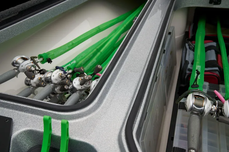 Slide: The Image of 2026 Ranger Z518 Cup-Equipped boat interior with cup holders and storage compartment. - 26