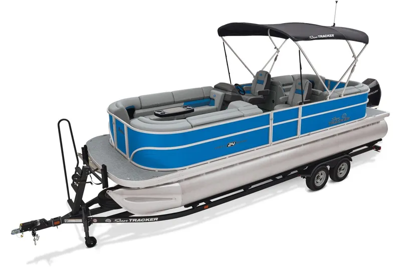 The Image of 2026 Sun Tracker Party Barge 24 XP3 pontoon boat displayed indoors at Brownie's Marine. - 1