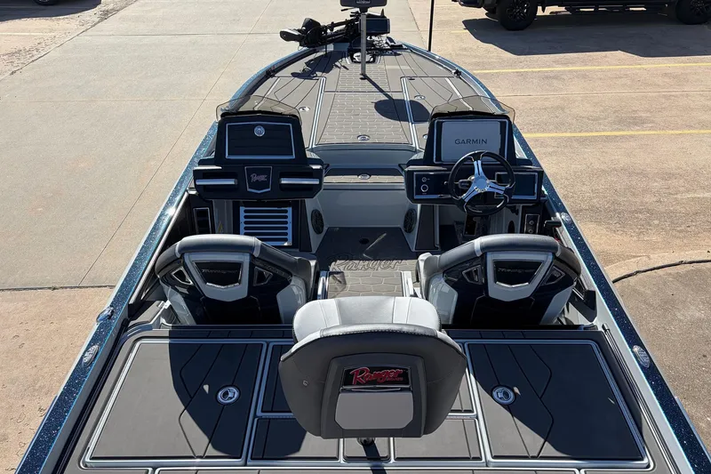 Slide: The Image of 2026 Ranger Z521R Cup-Equipped boat interior with advanced navigation systems and seating. - 13