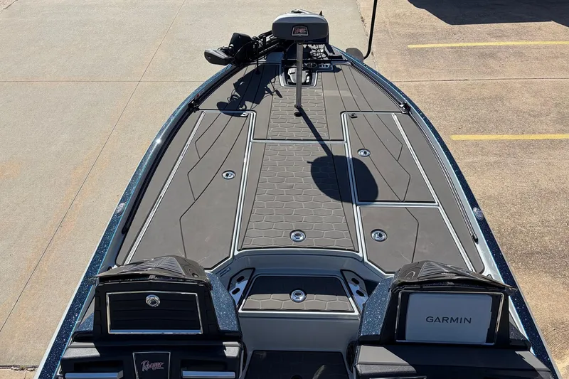 Slide: The Image of 2026 Ranger Z521R Cup-Equipped boat deck with Garmin electronics, showcasing sleek design. - 14