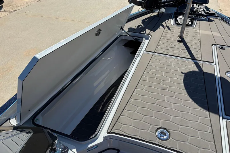 Slide: The Image of 2026 Ranger Z521R Cup-Equipped boat with open storage compartment on deck. - 22