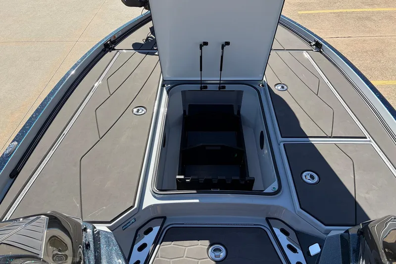 Slide: The Image of 2026 Ranger Z521R Cup-Equipped boat with open storage compartment on deck. - 25