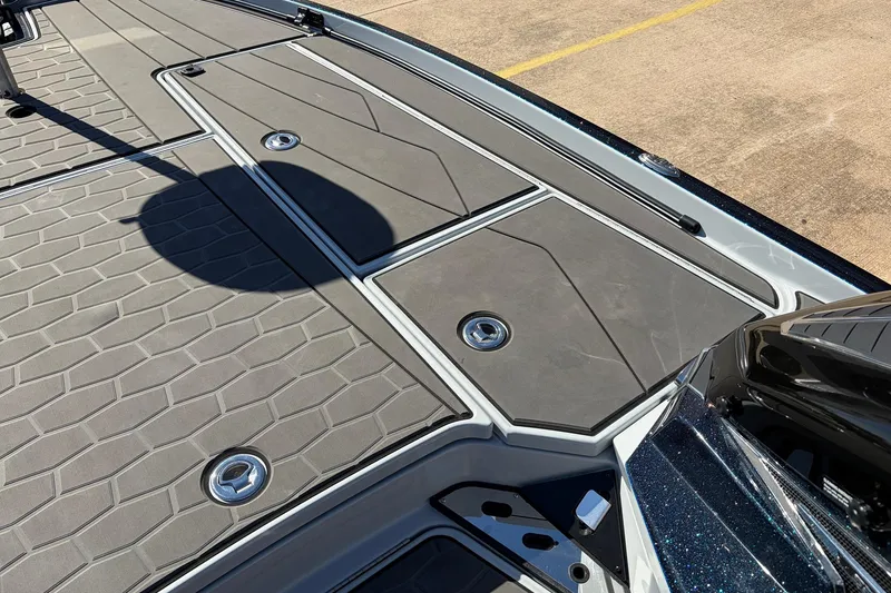 Slide: The Image of 2026 Ranger Z521R Cup-Equipped boat deck with sleek, modern design and storage compartments. - 27