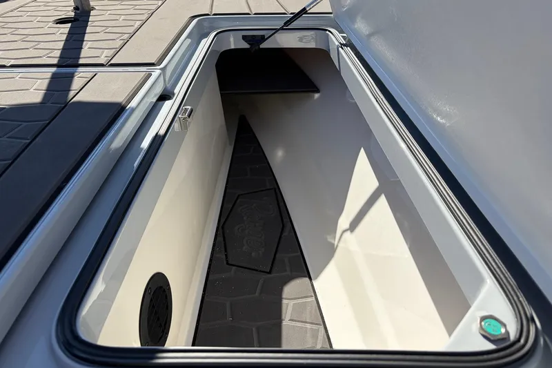 Slide: The Image of Open storage compartment in 2026 Ranger Z521R Cup-Equipped boat, featuring sleek design and ample space. - 30
