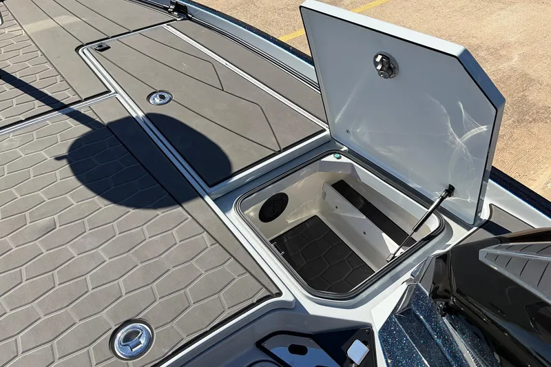 Slide: The Image of 2026 Ranger Z521R Cup-Equipped boat with open storage compartment on deck. - 31