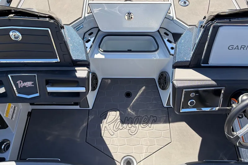Slide: The Image of 2026 Ranger Z521R Cup-Equipped boat interior with advanced dashboard and storage compartments. - 34